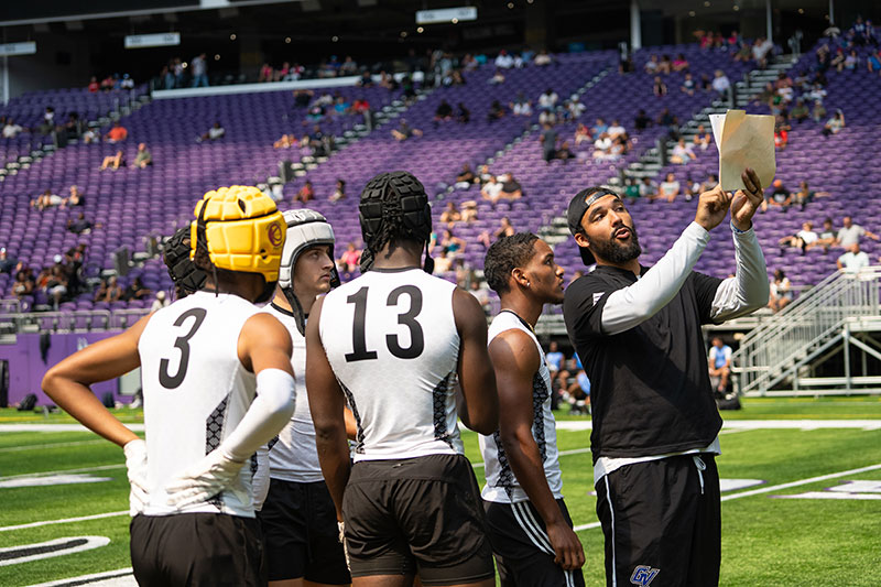 Coach Talking to Players